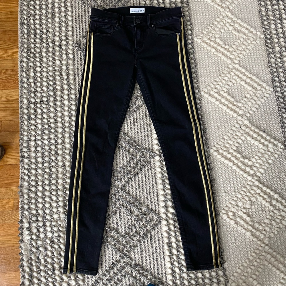 Black jeans with gold stripe down the side